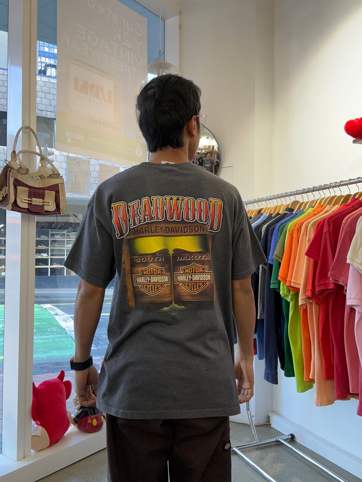 vintage Harley-Davidson graphic t-shirt from Deadwood, South Dakota featuring a cowboy and motorcycle design 2008