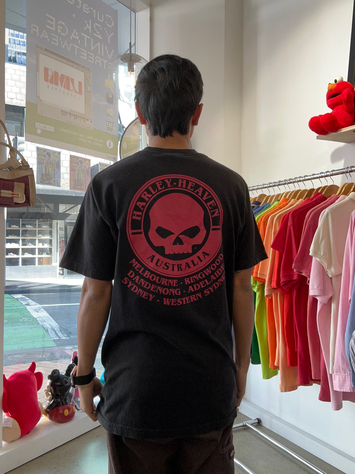 black Harley-Davidson Australia graphic t-shirt featuring a skeleton jester or joker riding a motorcycle, marked with a 2017 copyright Large