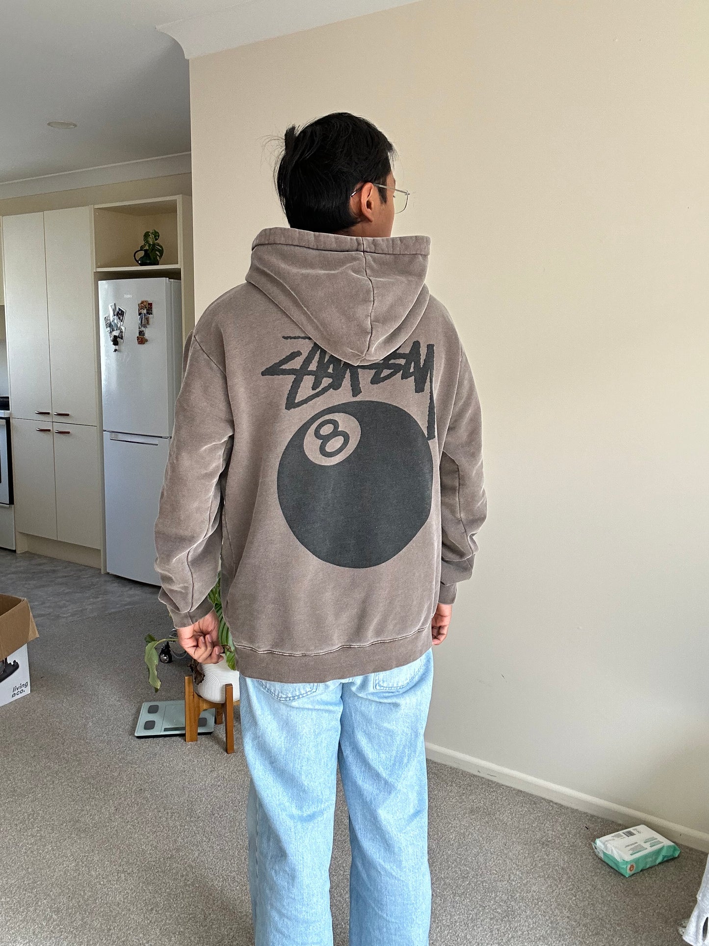Stüssy 8 Ball Pigment Dyed Hoodie in a brown/taupe color, made from heavy cotton fleece