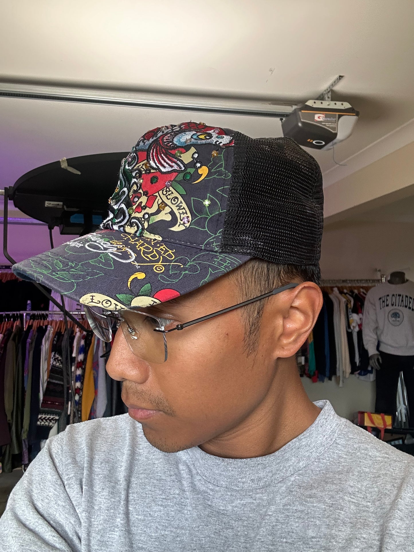 Ed Hardy by Christian Audigier trucker cap, often featuring signature tattoo-inspired graphics and rhinestone