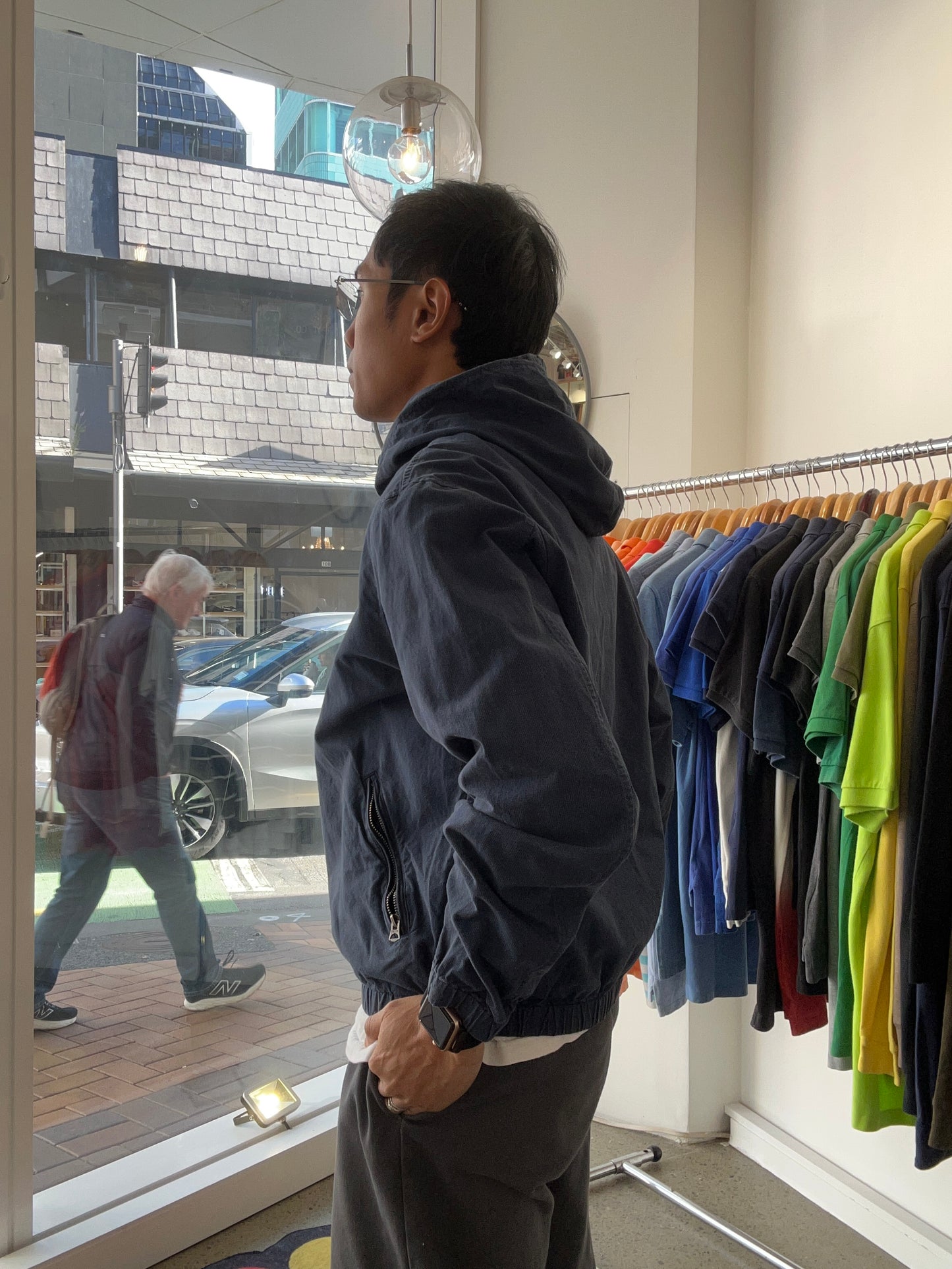 dark blue Polo Ralph Lauren hooded windbreaker features a distinctive red embroidered logo on the chest Navy Blue Large