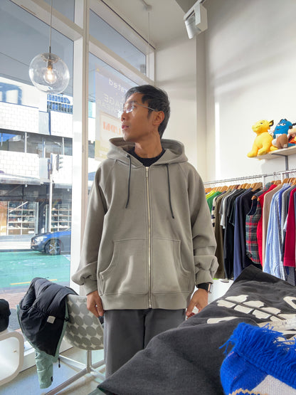 Heavy weight gray zip-up hoodie is likely an oversized Medium