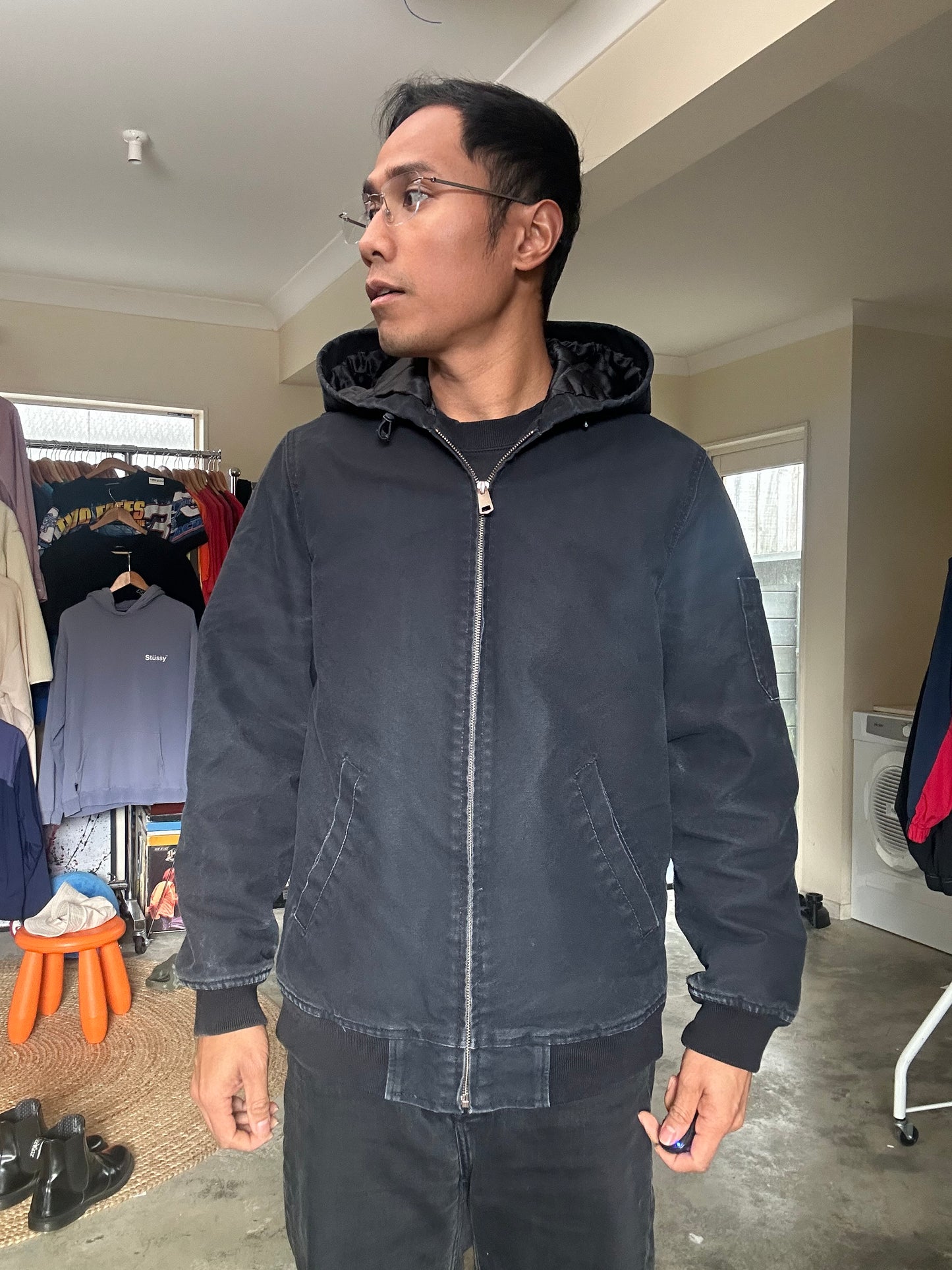 black hooded jacket from the Lands' End Workwear line, featuring a quilted lining Medium
