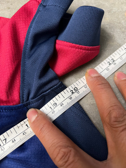 Nike FC Barcelona 2024/25 Home Jersey features a distinct split red and blue design with a gold Nike Swoosh