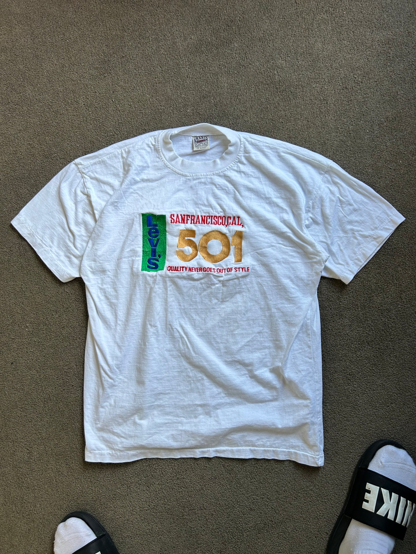 Vintage  Levi's 501 t-shirt features a embroidered "San Francisco, Cal" and "501" graphic across the chest Medium