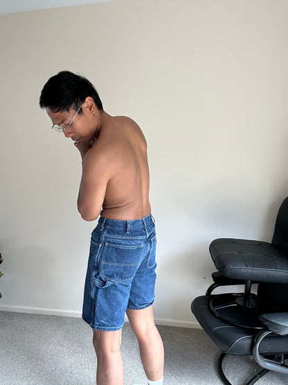 Dickies relaxed-fit denim carpenter shorts in a dark wash blue color size 28 waist
