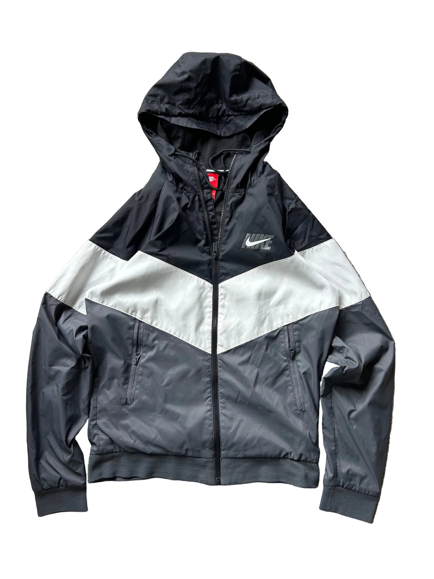 Nike Men's Sportswear Windrunner Jacket in a black, white, and dark grey colorway, model number AJ1396-010 Small