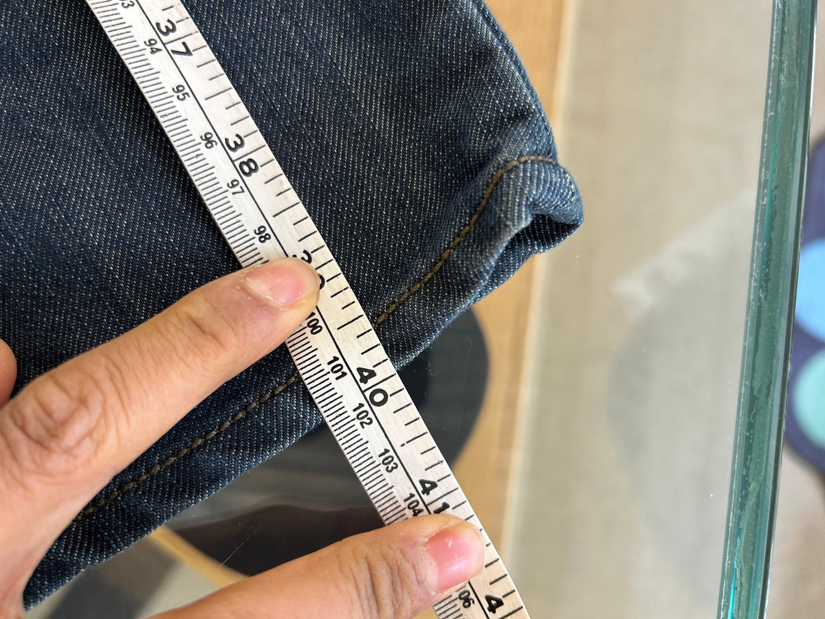 Levi's 514 Slim Straight Jeans featuring unique back flap pockets and a twisted seam design size 32