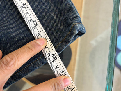 Levi's 514 Slim Straight Jeans featuring unique back flap pockets and a twisted seam design size 32