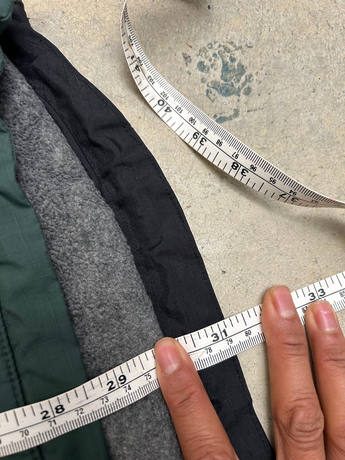 vintage Nautica Competition pullover jacket featuring a green nylon shell with a grey fleece lining and orange accents XL