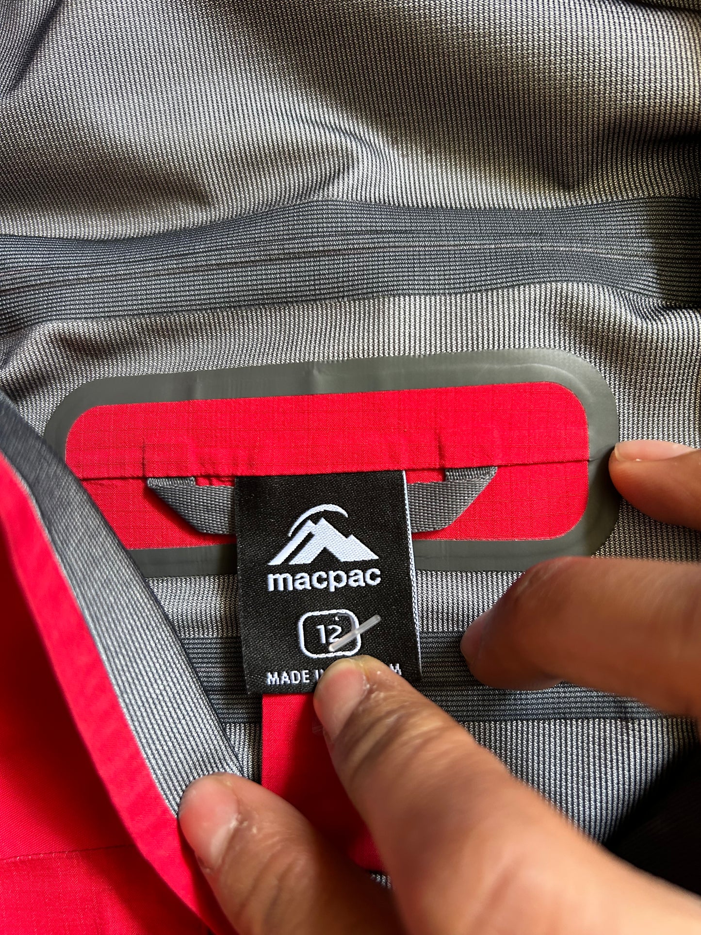 Macpac Lightweight Prophet Rain Jacket, a technical alpine hardshell designed for extreme conditions above the snowline Alpine Series Medium Red
