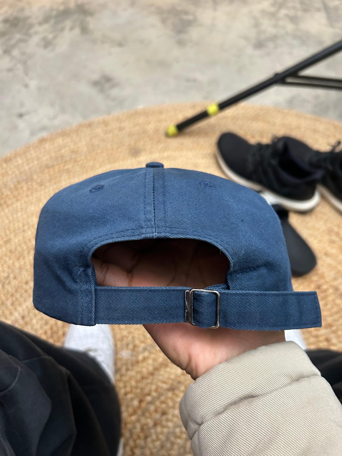 Vintage blue Nike cap featuring an embroidered gold swoosh logo Osfa