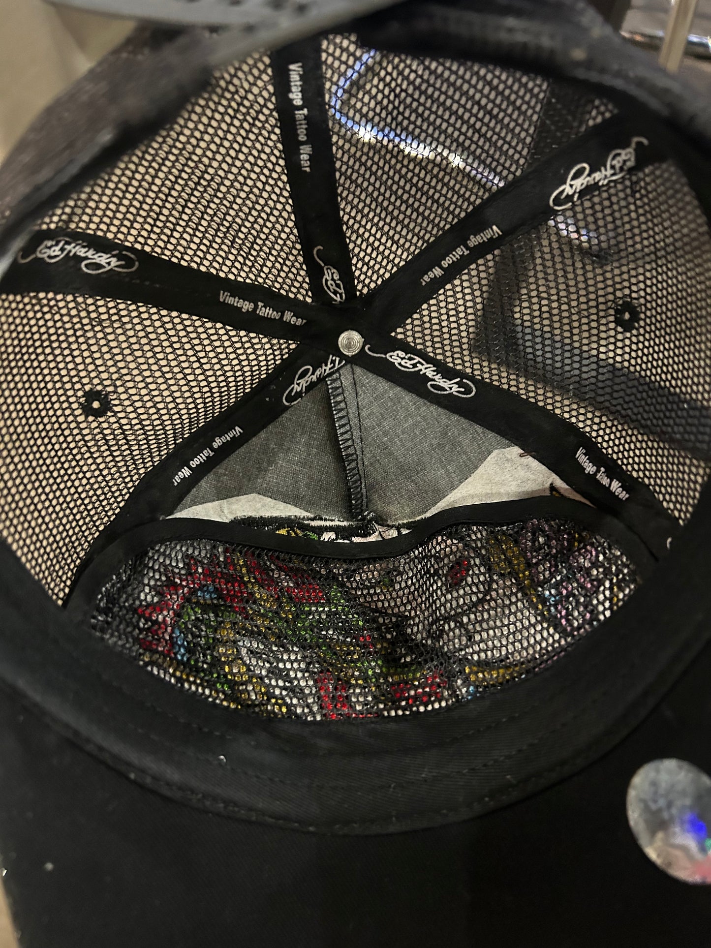 Vintage black Ed Hardy trucker cap features prominent embroidered dragon and geisha
