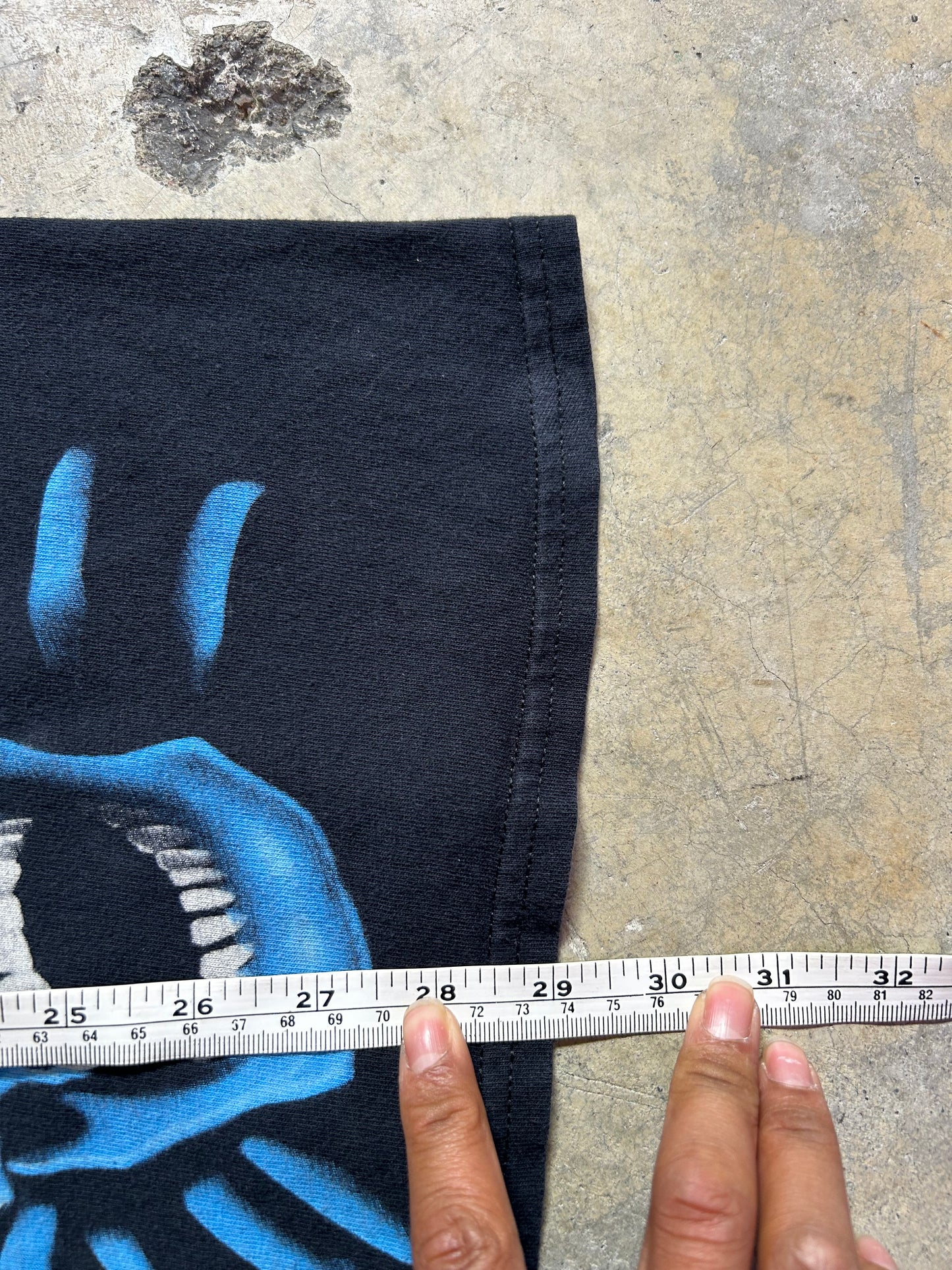 Liquid Blue "Skull Pile" t-shirt, known for its all-over print featuring blue skeletons XL Black 2017