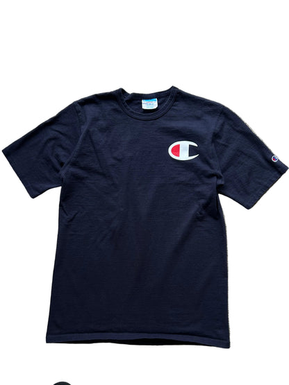 Champion Navy cotton t-shirt with a large C logo on the chest and a  logo on the sleeve Large