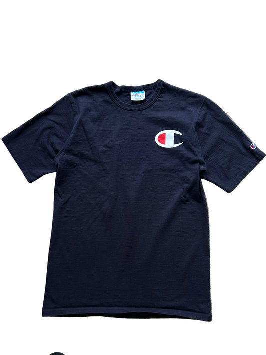 Champion Navy cotton t-shirt with a large C logo on the chest and a  logo on the sleeve Large