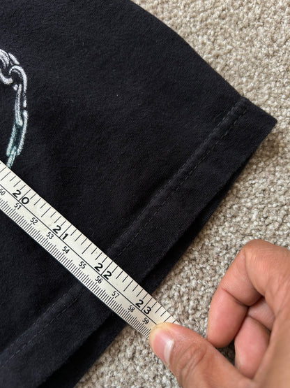 black graphic t-shirt featuring a skeleton playing an electric guitar Hot Rock Tee