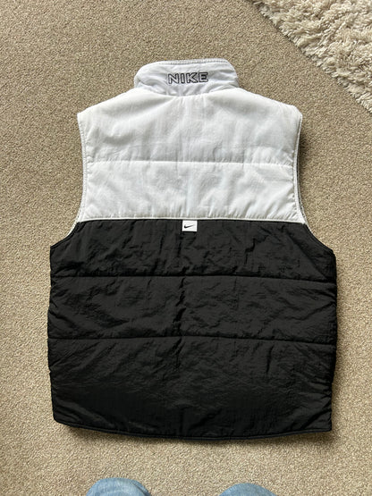 Vintage Nike Sportswear Reversible Puffer Vest in black and white XL