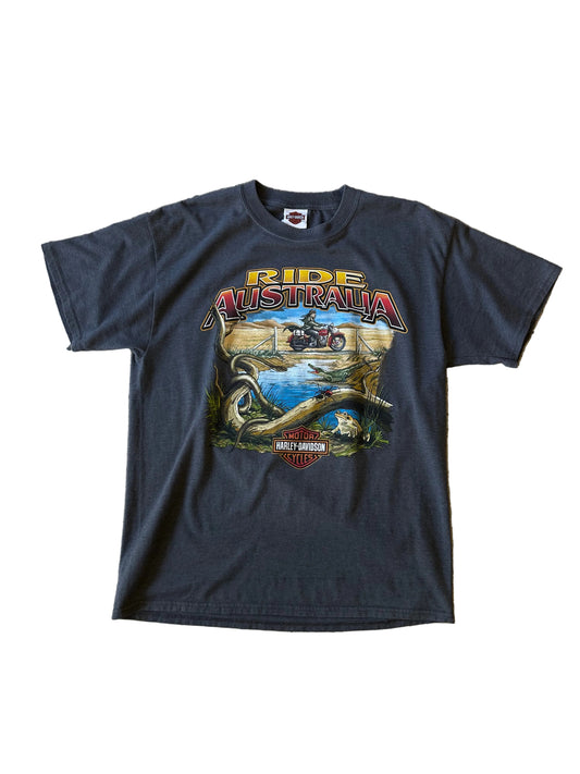 vintage 1990s Harley-Davidson "Ride Australia" graphic t-shirt in a grey or charcoal wash.Queensland 2003