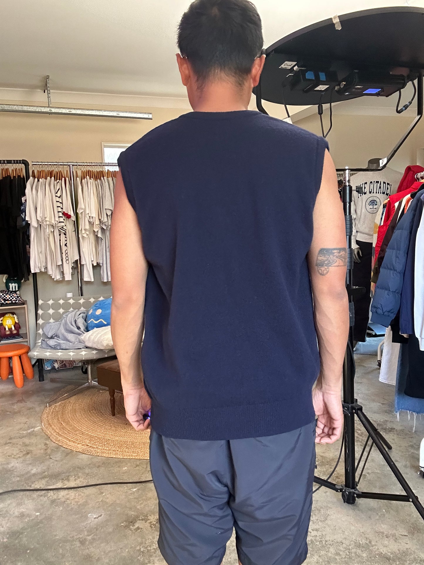 navy blue knitted v-neck vest is a vintage Wolsey brand garment made in New Zealand Medium
