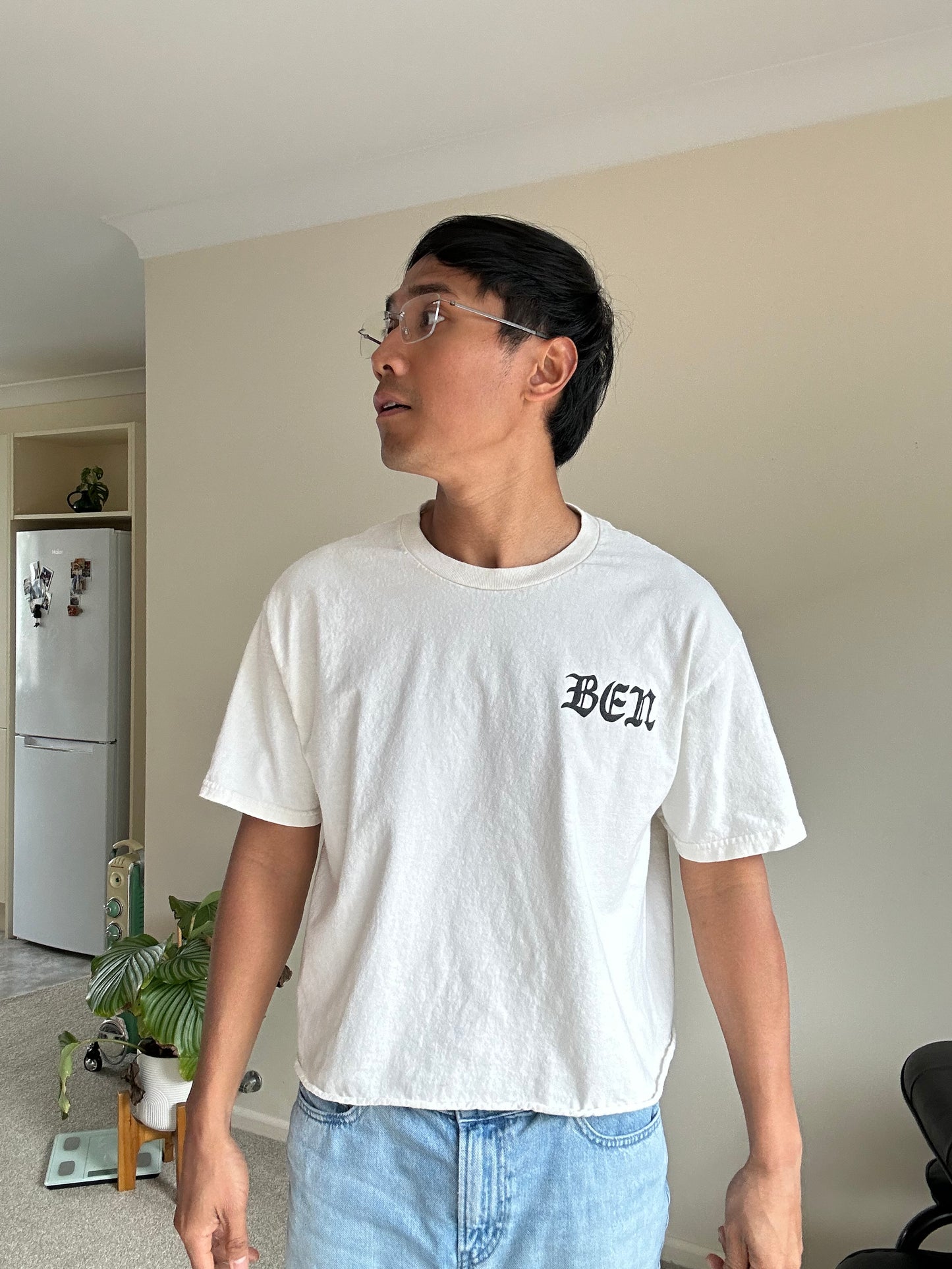 Cream cropped t-shirt with "BEN" printed in black on the chest and neckline Large