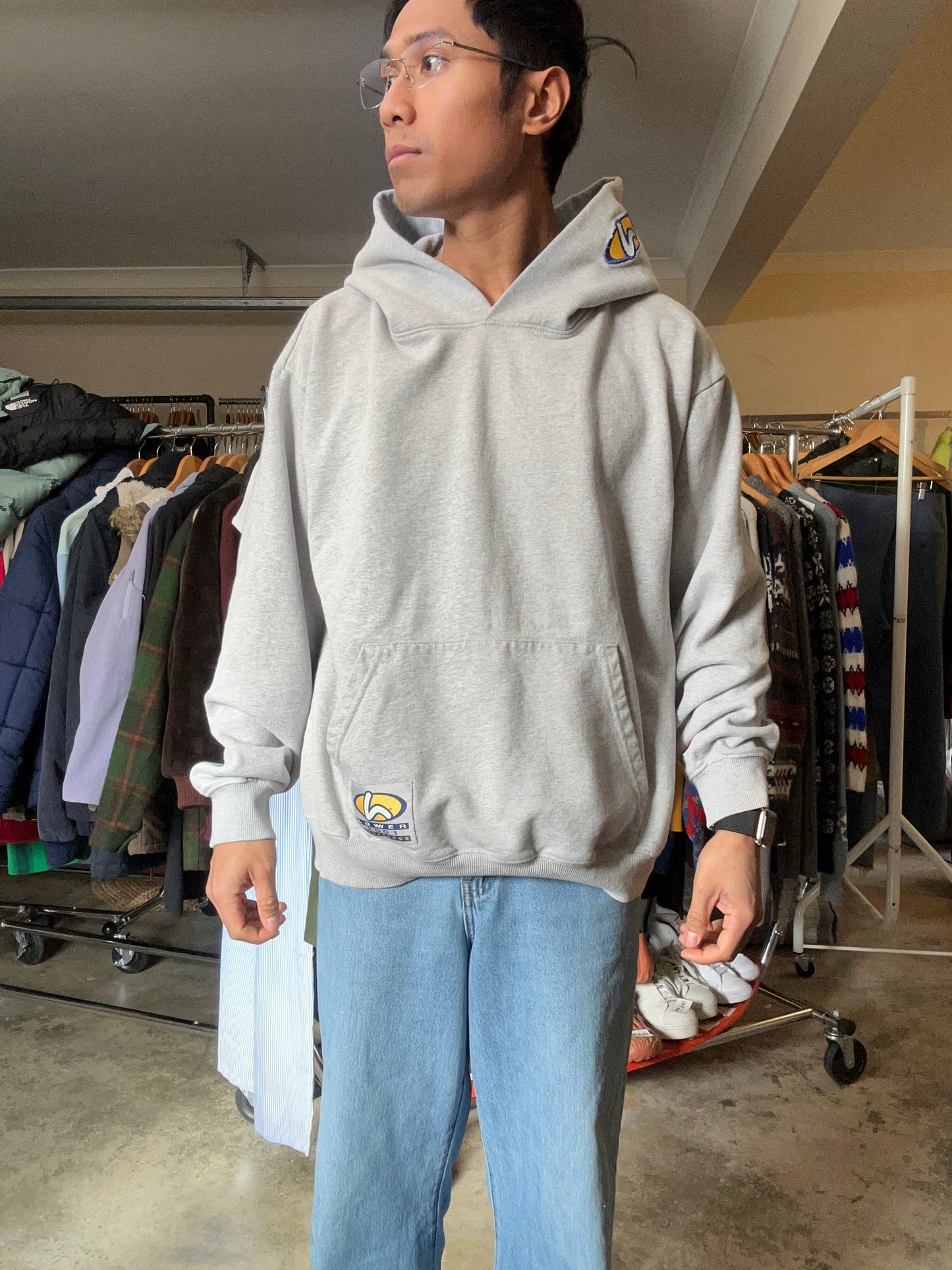 Lower hoodie featuring a distinctive yellow and blue logo patch on the hood and pocket Large Boxy