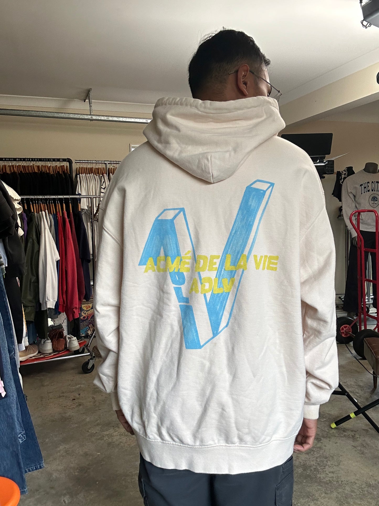 cream-colored zip-up hoodie  "Acmé de la Vie" (ADLV)