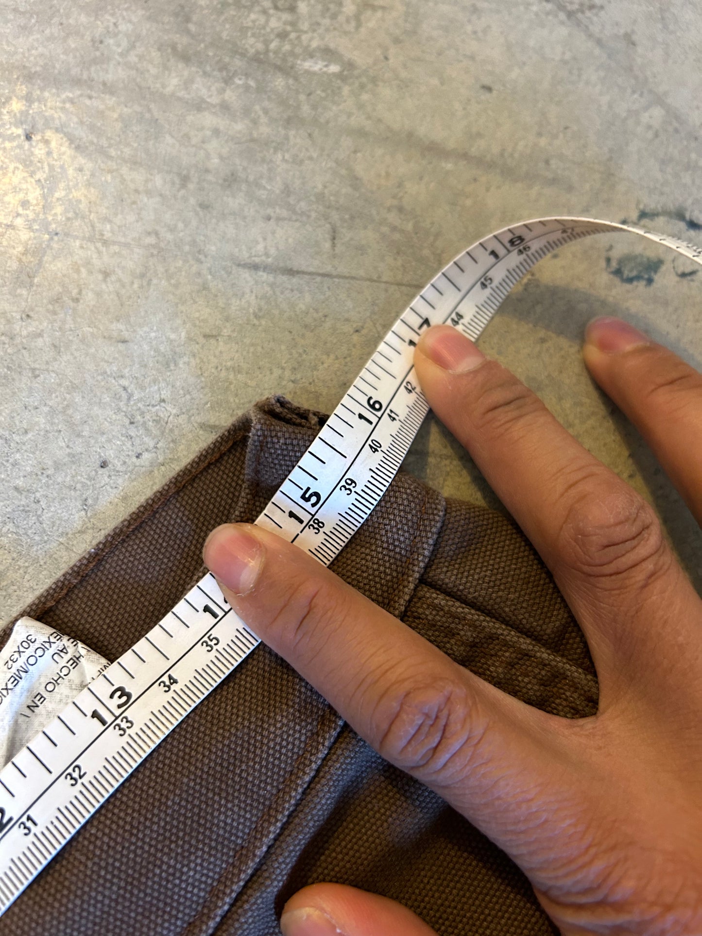 Vintage brown Dickies Relaxed Fit Duck Carpenter Jeans featuring a hammer loop and dual tool pockets