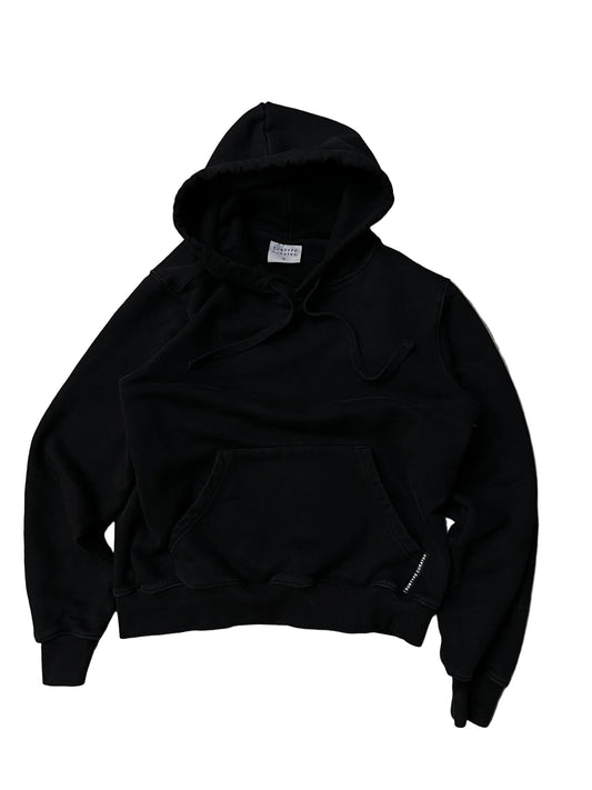 black Subtype Curated hoodie features a prominent kangaroo pocket and a clean, minimalist design Small