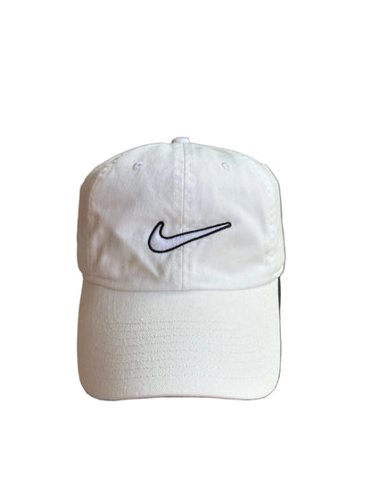 White Nike Club Cap with an outlined black Swoosh logo