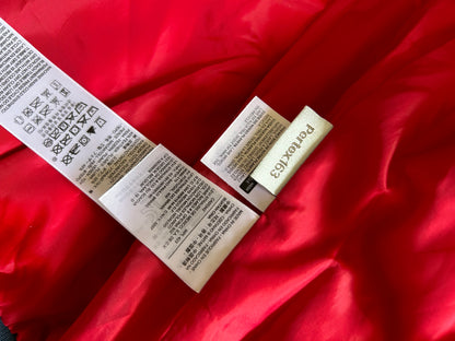 Pertex blue puffer jacket with a red inner lining and red zippers, produced by Levi's Small