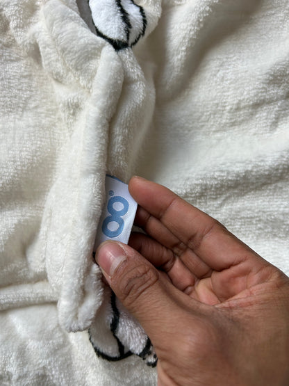 Jed's branded wearable blanket hoodie, "Oodie Cream