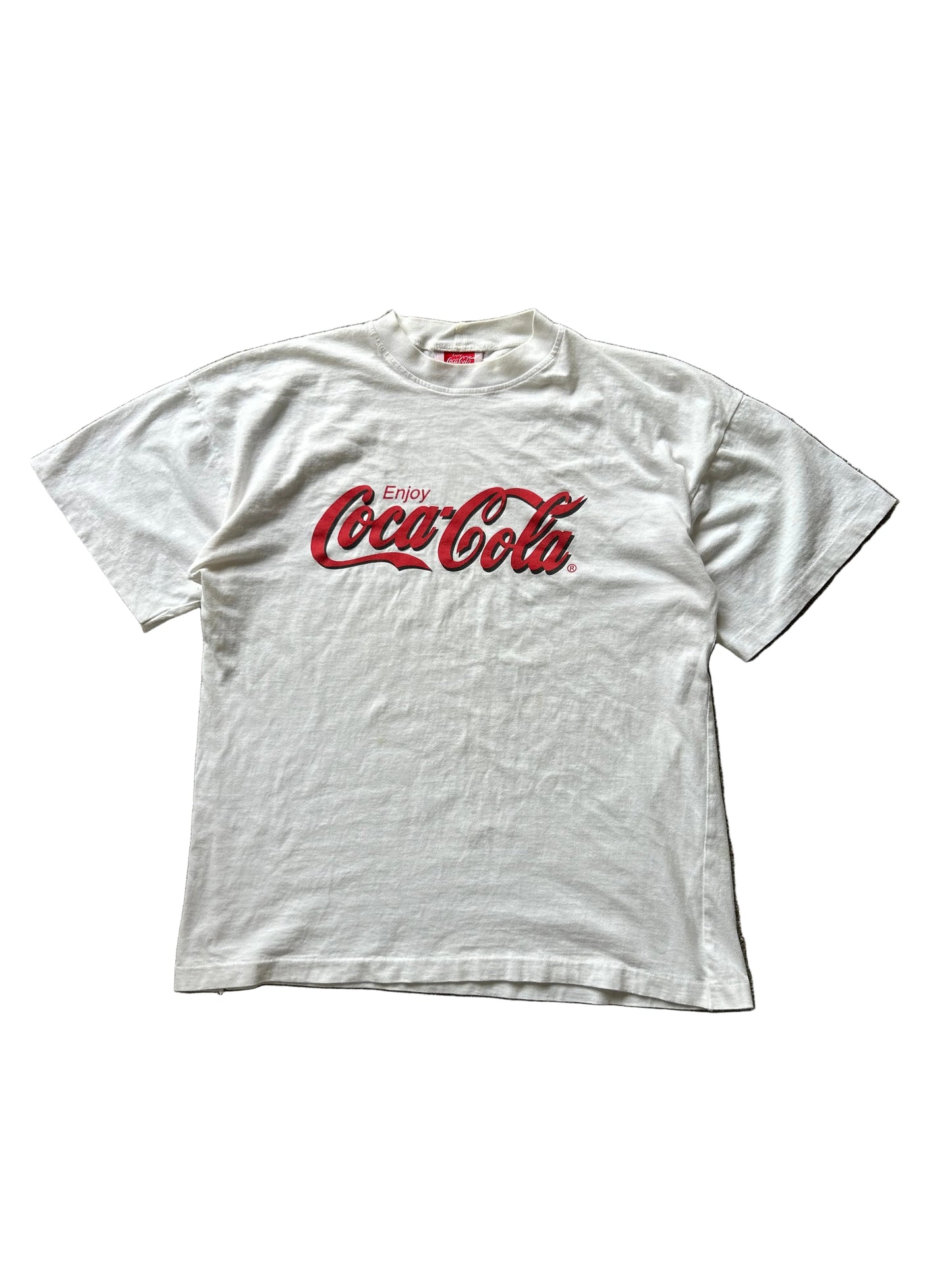 vintage white t-shirt featuring the classic red "Enjoy Coca-Cola" script logo Large