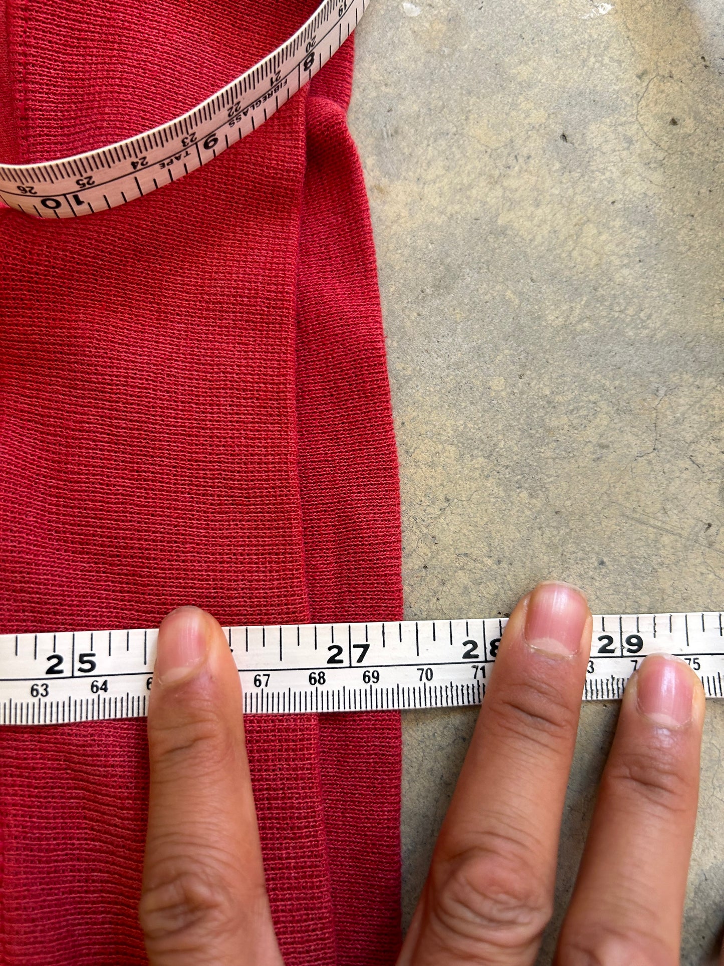 Vintage Fade red Champion hoodie features a prominent arched "HARVARD" spellout graphic and a comfortable kangaroo pocket Large