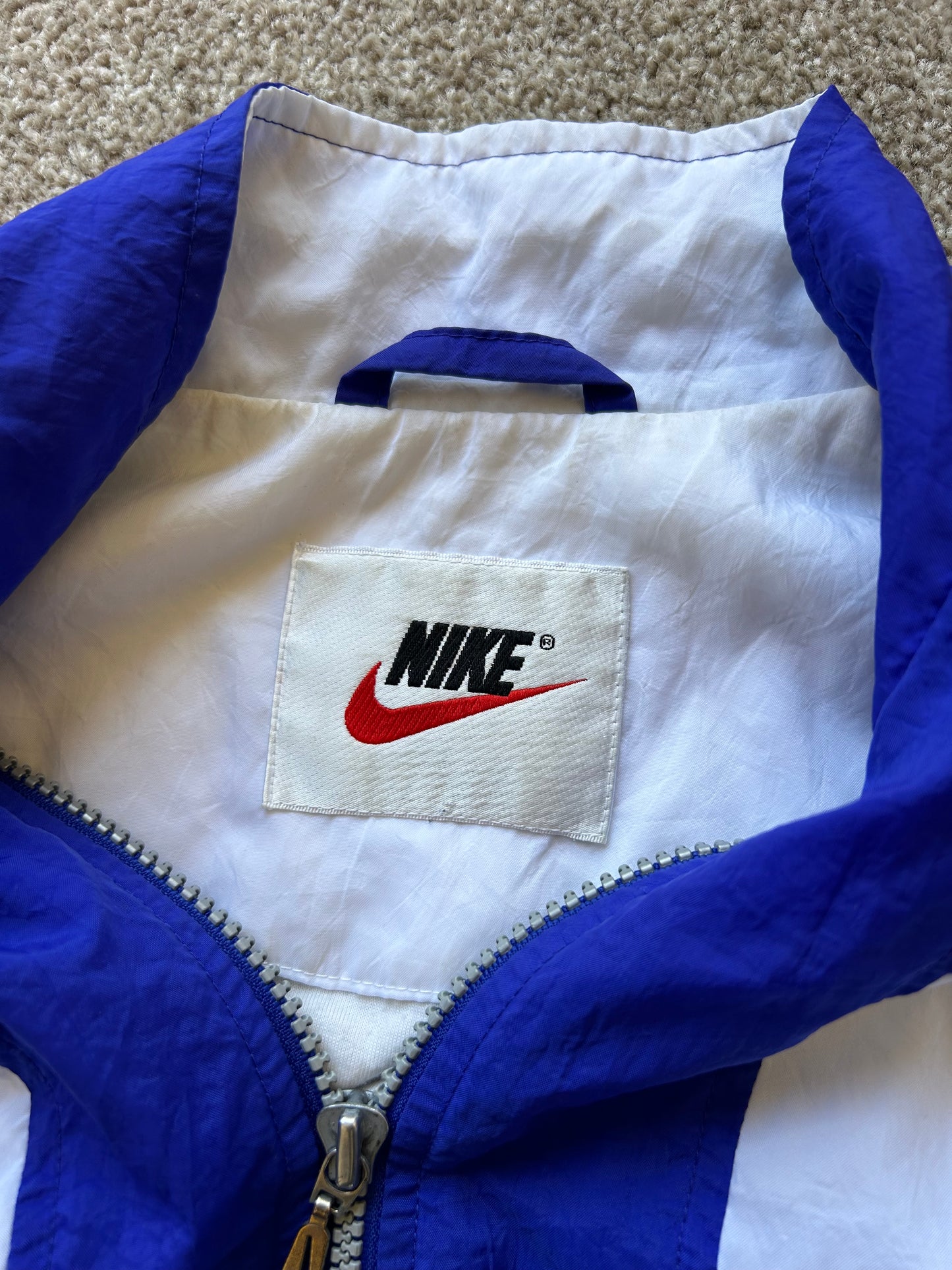 vintage Nike 90s woven windbreaker jacket in blue and white Medium