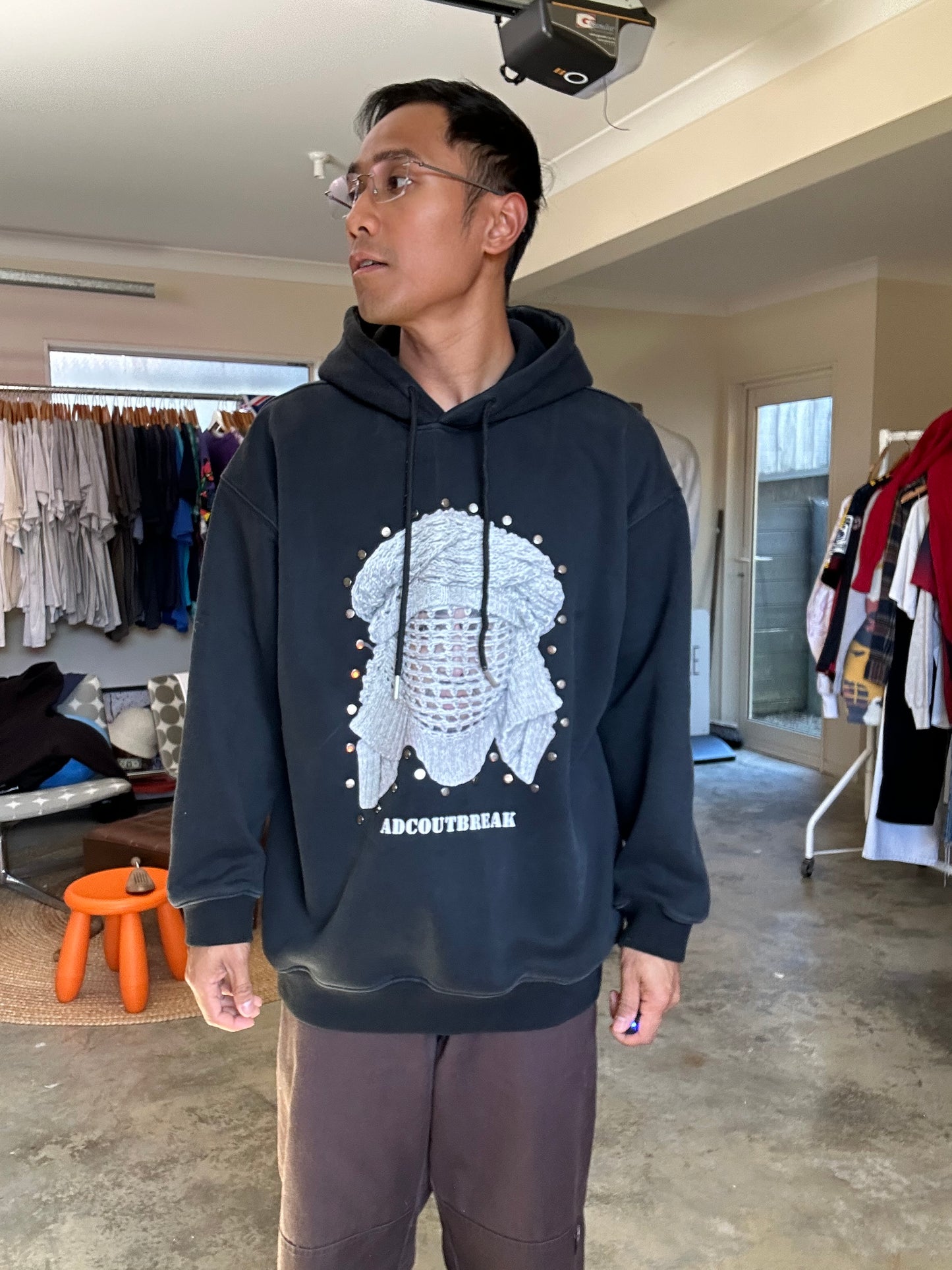 ADC crystal-mask print hoodie, featuring a graphic print of a masked figure and metallic studs Medium Black