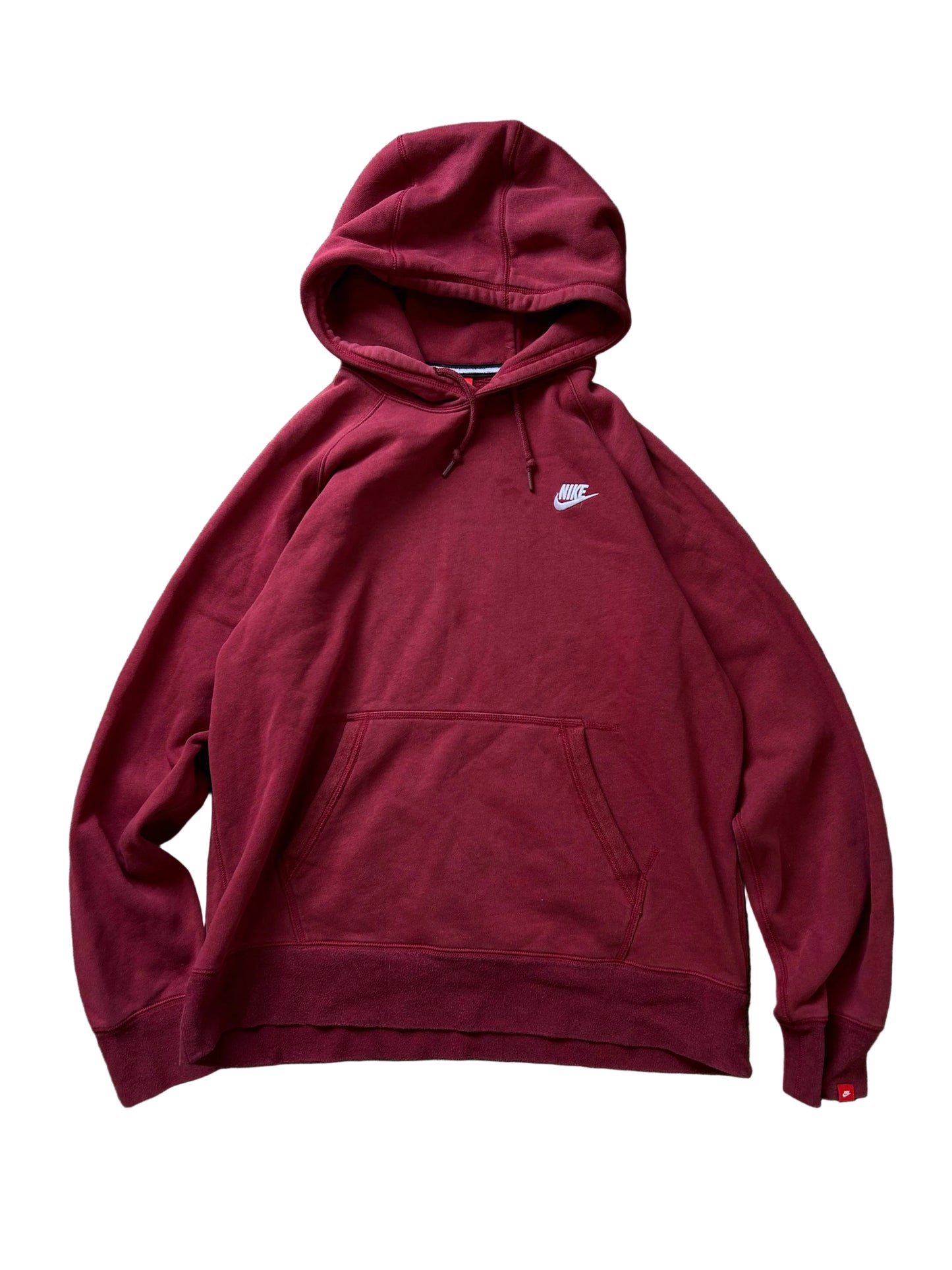 Nike Club fleece hoodie features a rich burgundy color and a classic pullover design with a front kangaroo pocket Large