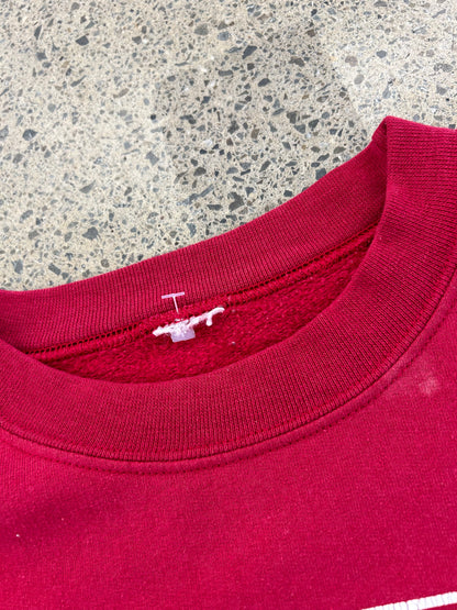 Vintage red crewneck sweatshirt features an Iowa State University graphic with the mascot Cy Medium