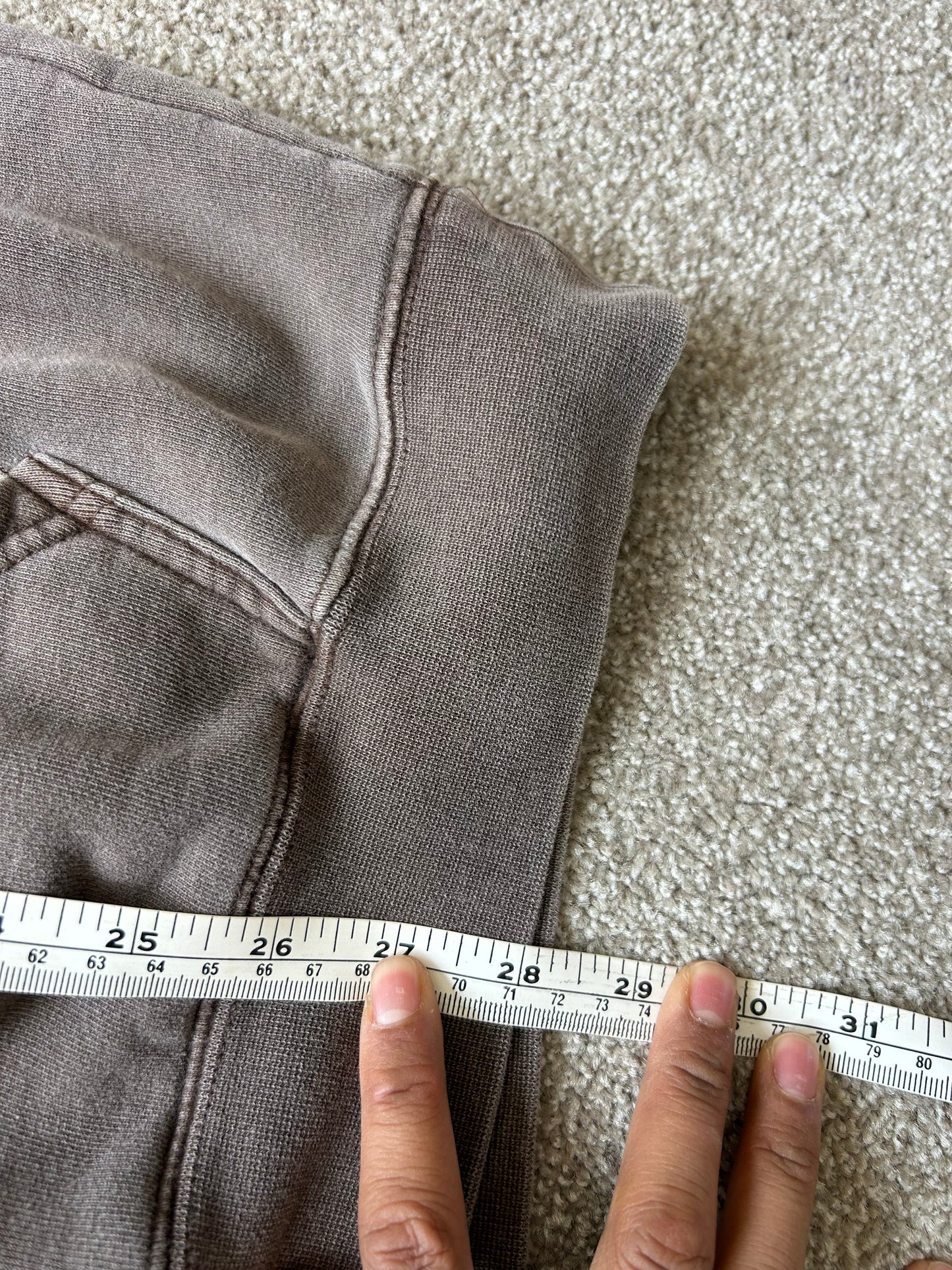 Stüssy 8 Ball Pigment Dyed Hoodie in a brown/taupe color, made from heavy cotton fleece