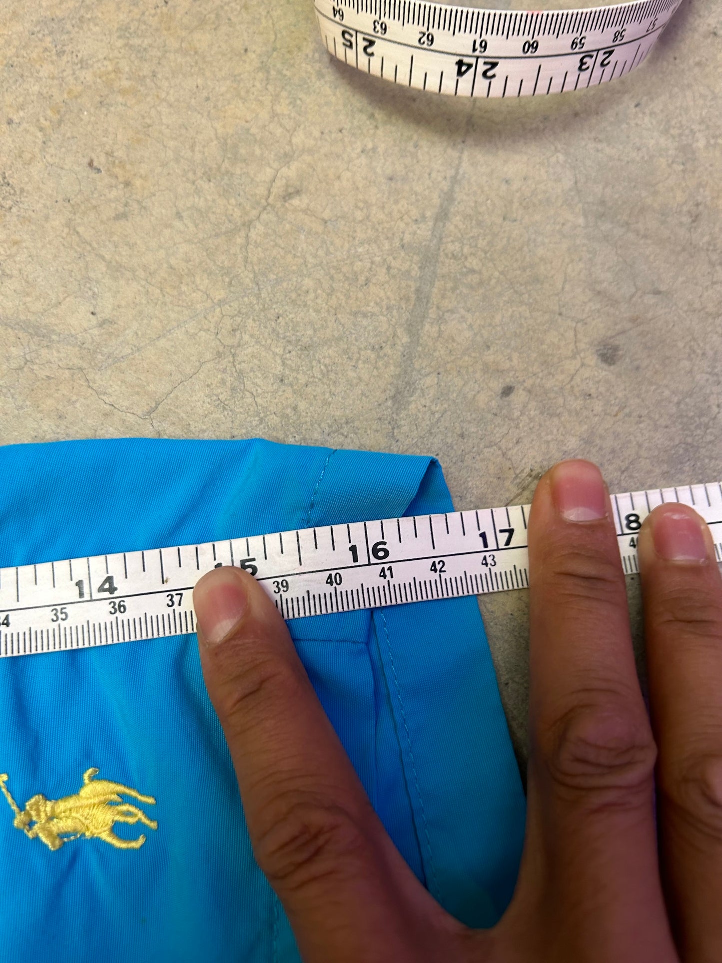 Ralph Lauren swim trunks featuring a blue body with a yellow pony logo Shorts Large