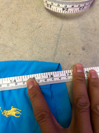 Ralph Lauren swim trunks featuring a blue body with a yellow pony logo Shorts Large