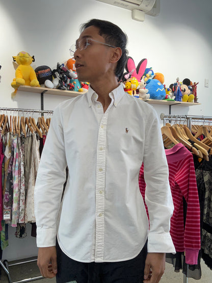 white Polo Ralph Lauren Oxford Shirt, featuring a button-down collar, long sleeves, and the signature embroidered polo player logo on the chest. Small