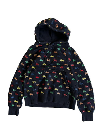 black, pullover-style hoodie featuring an all-over, multi-colored Stüssy logo print Small