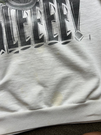 vintage white crewneck sweatshirt features a large graphic of Ed the hyena from The Lion King with the text "MAN ARE YOU UGLEEEE Large
