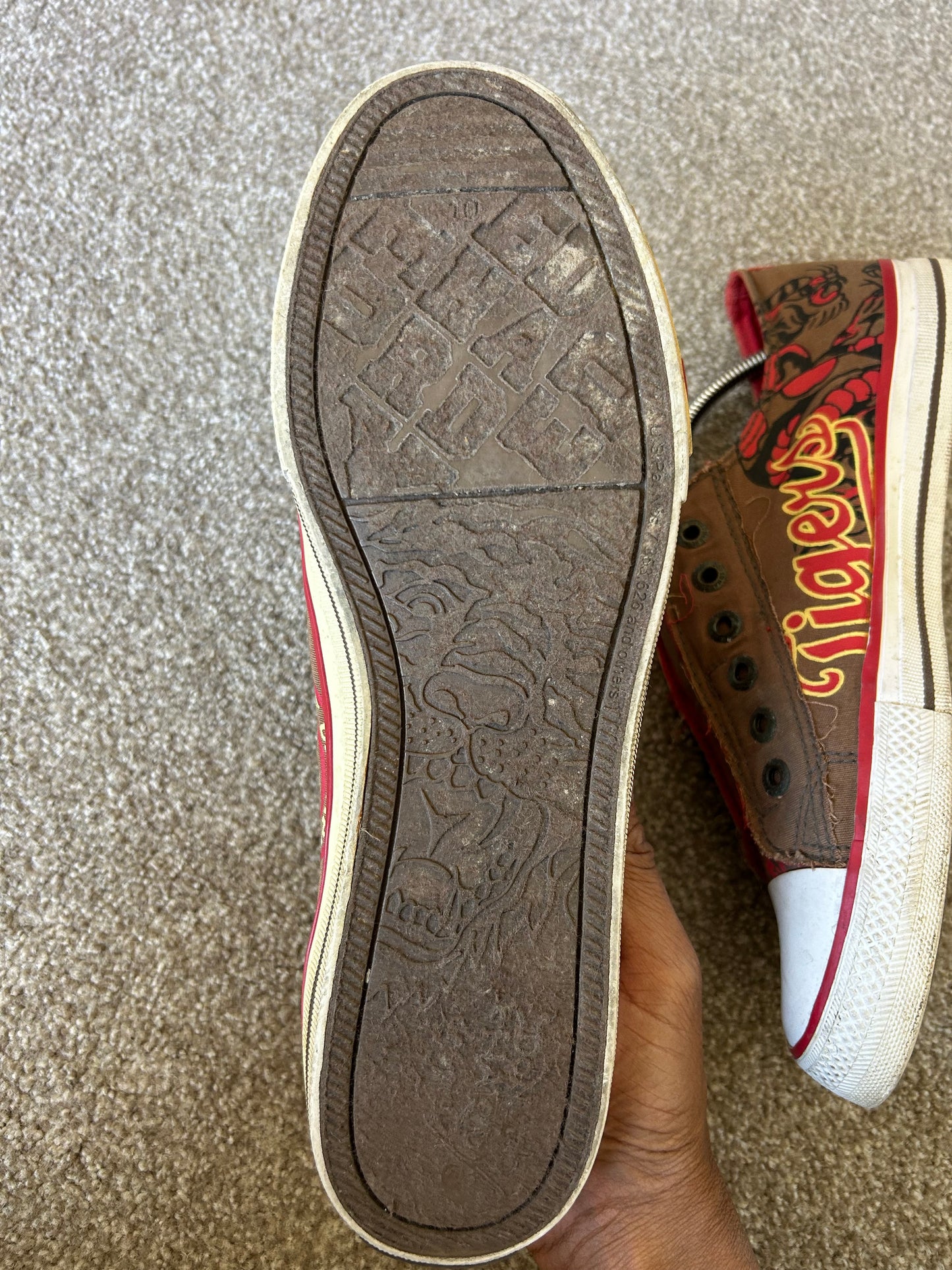 Ed Hardy slip-on canvas sneakers in brown and red with graphic prints.l Brown size US 10 EU 44
