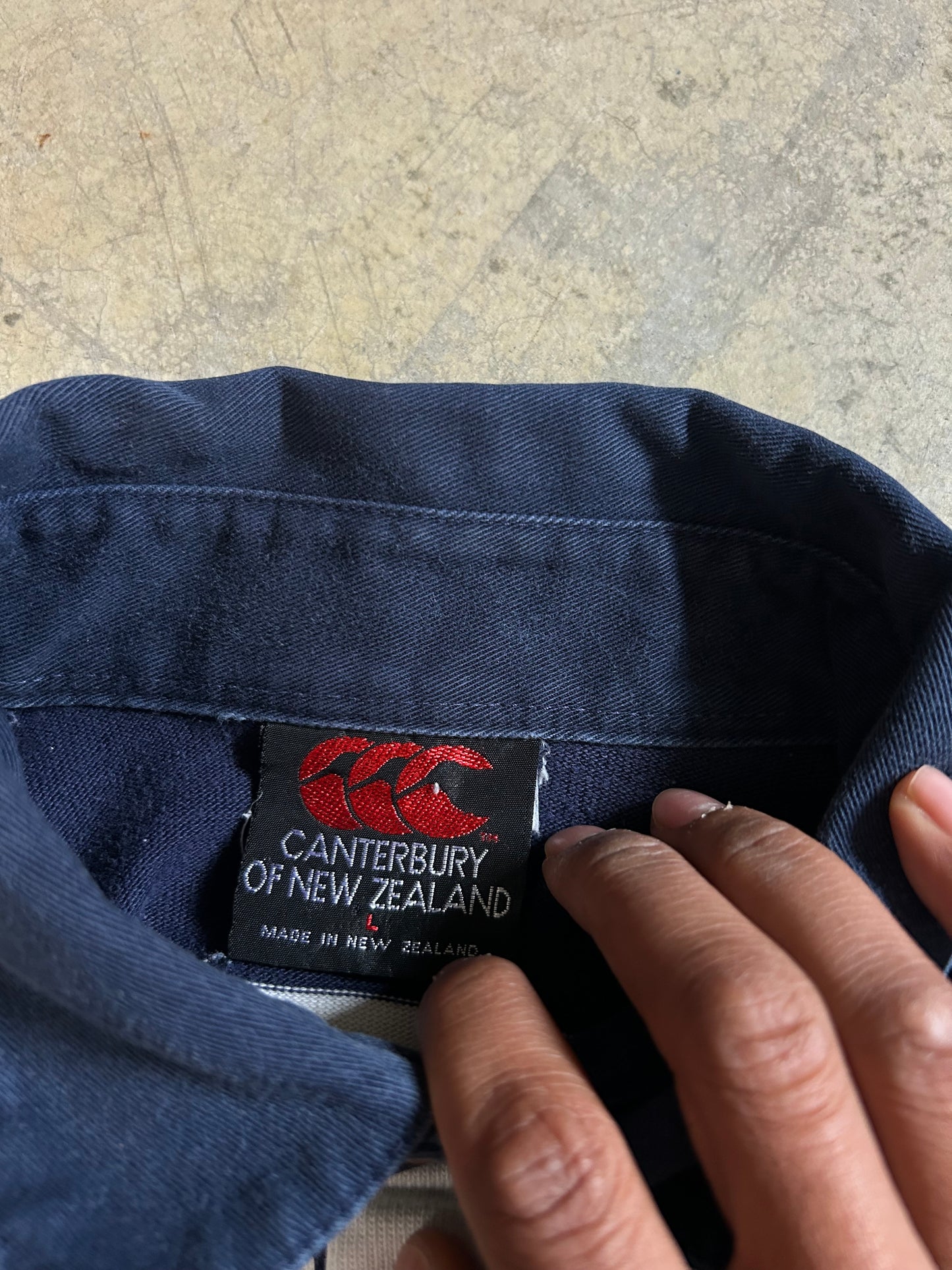 vintage Canterbury of New Zealand striped rugby shirt featuring the brand's iconic 'three kiwis' logo Navy Large