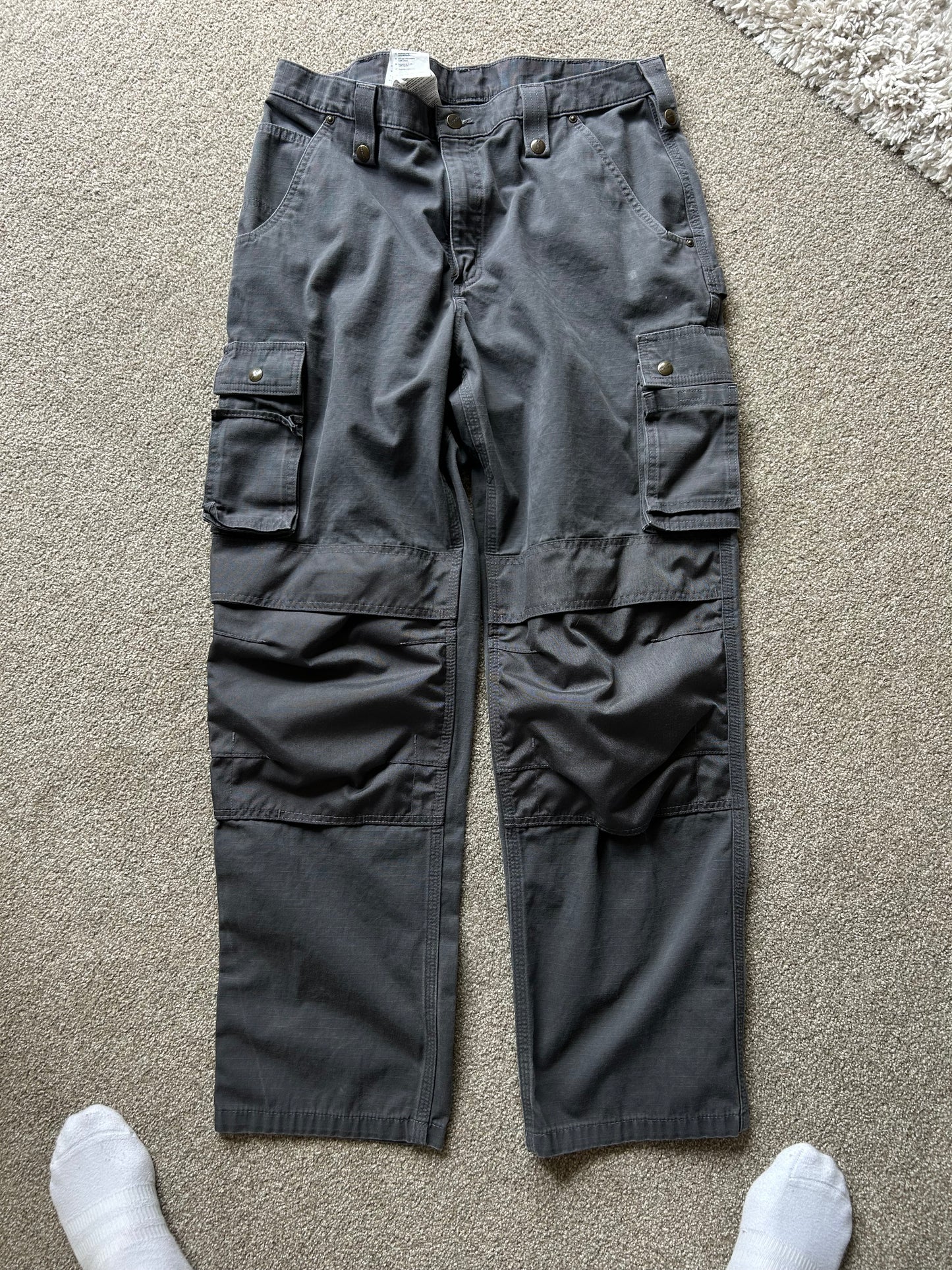 Carhartt Men's Multi Pocket Washed Duck Pants, designed for heavy-duty work with multiple storage pockets and reinforced knees.  Grey 36 waist
