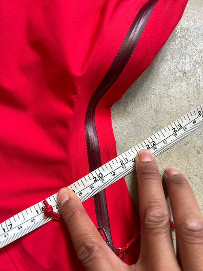 Macpac Lightweight Prophet Rain Jacket, a technical alpine hardshell designed for extreme conditions above the snowline Alpine Series Medium Red