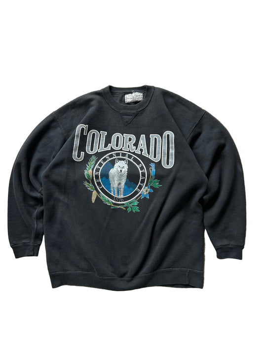 vintage black crewneck sweatshirt featuring a graphic of a wolf and the text "Colorado Centennial State 1876 XL
