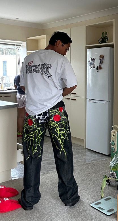 Vintahe RMC Martin Ksohoh wide-leg denim jeans with embroidered skull and rose graphics. size 35 waist